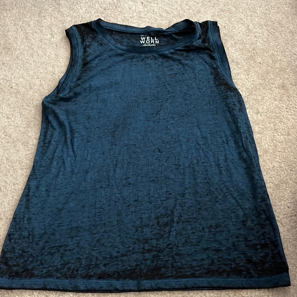 Medium high crew neck sleeveless tank!